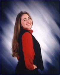 A graduation photo that was taken right around my 18th birthday.