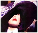 Kate Winslet as Rose Dewitt Bukater in Titanic. -- Looking up at the ship as it looms above her like an executioner.